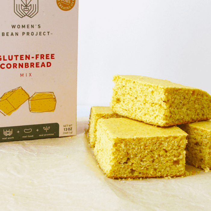 Women's Bean Project Gluten-free cornbread mix and a stack of cornbread.