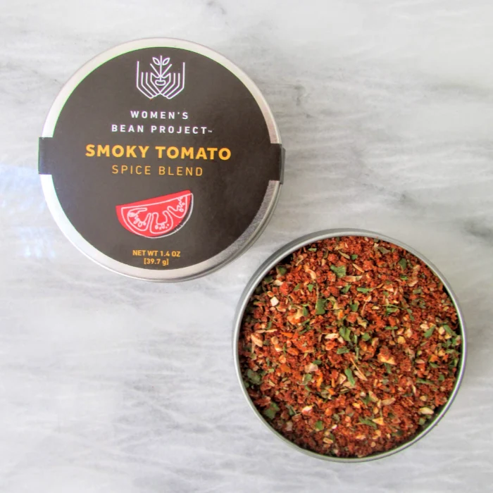 An open tin of Women's Bean Project Smoky Tomato Spice Blend.