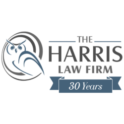 Black and navy blue logo of an owl reading The Harris Law Firm 30 Years.